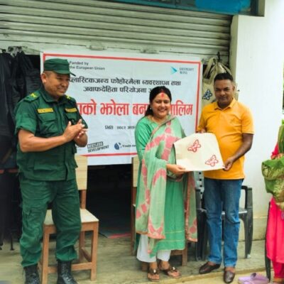Young people celebrating the participants’ success after a transformative 5-day cloth bag-making training.