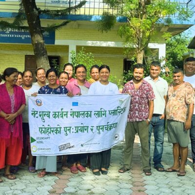 Young people celebrate the Model Neighborhood inauguration with community members.